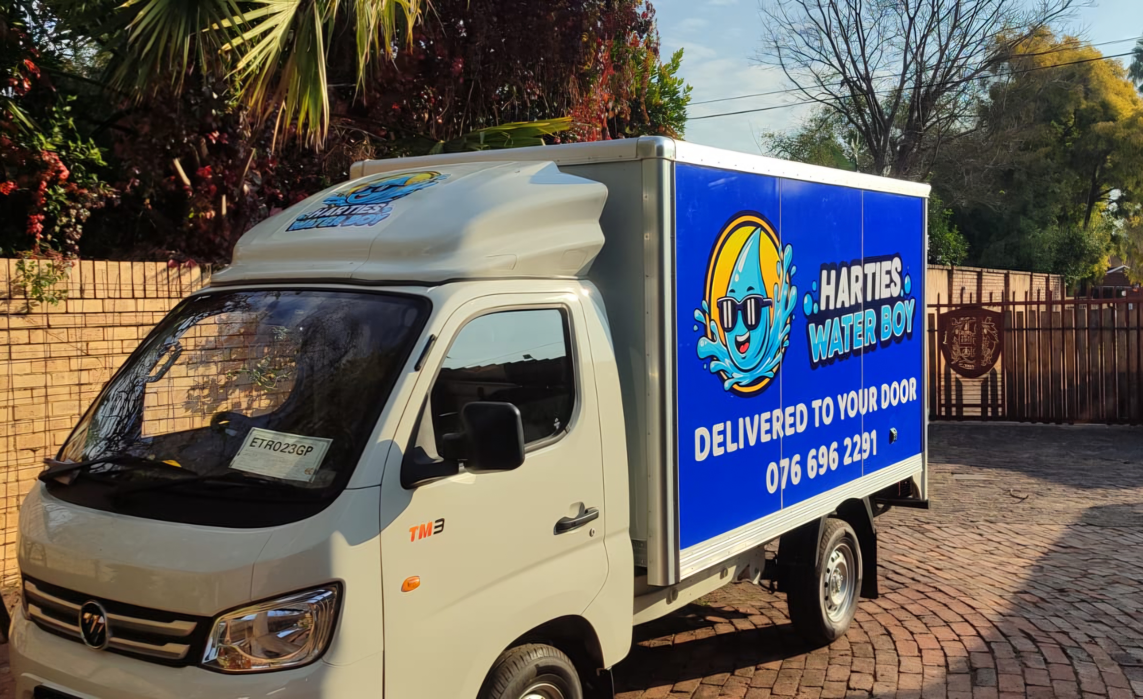 Harties Water Boy full delivery vehicle wrap with logo and contact details